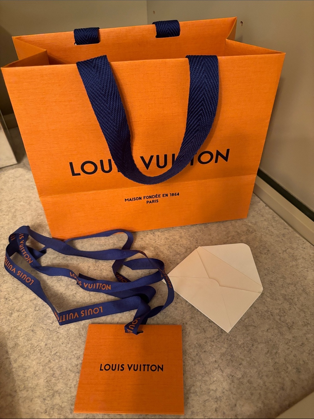 Small Louis Vuitton Orange Bag with Navy Ribbon and Card Set